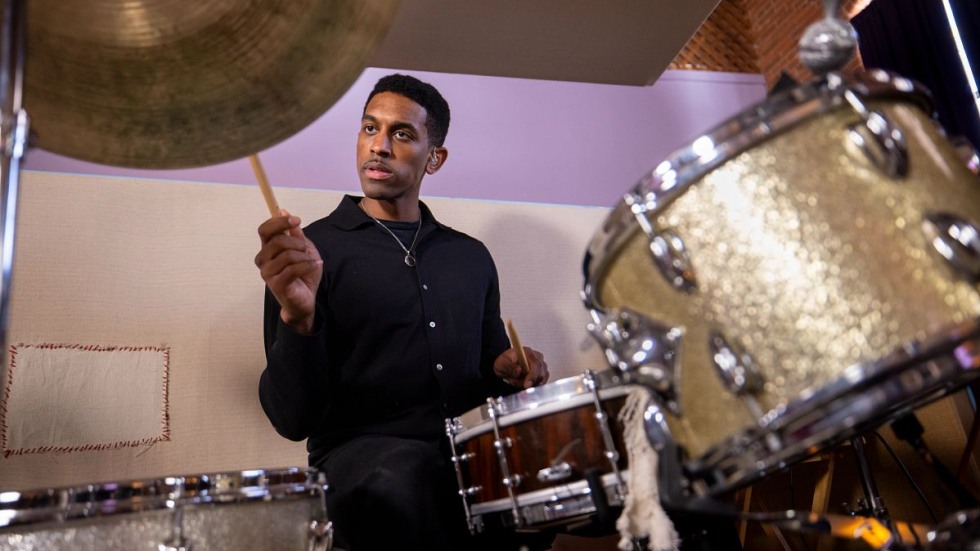 Marcus Grant playing drums 