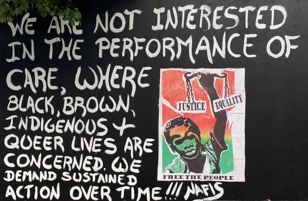 Mural with quote from Nafis M White "“We are not interested in the performance of care, where Black, Brown, Indigenous + Queer lives are concerned. We demand sustained action over time!!!” 