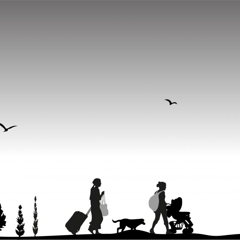 Black and white image of family migration on foot