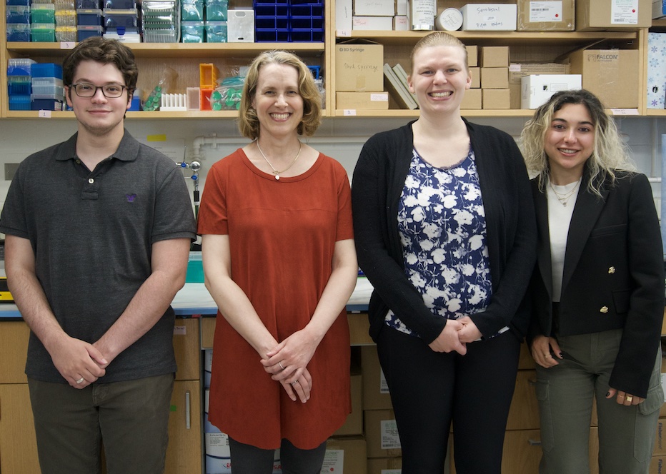 Group photo of Diane Hoffman-Kim and students in her lab.