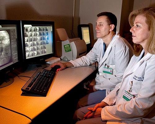 Medical physics faculty review scans