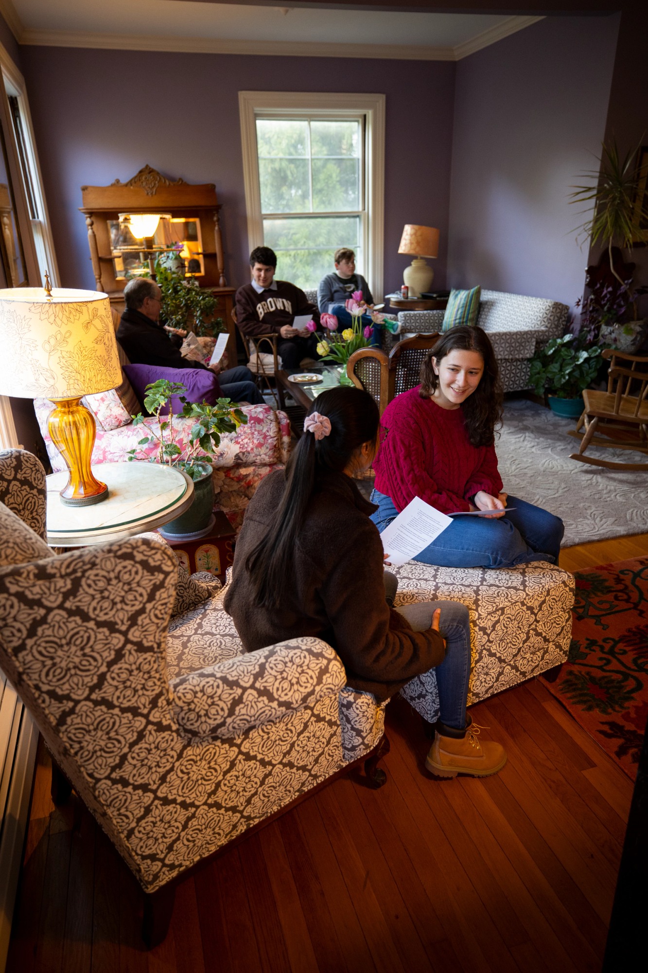 Students gather at the chaplain's home for Thursday Night Interfaith Supper