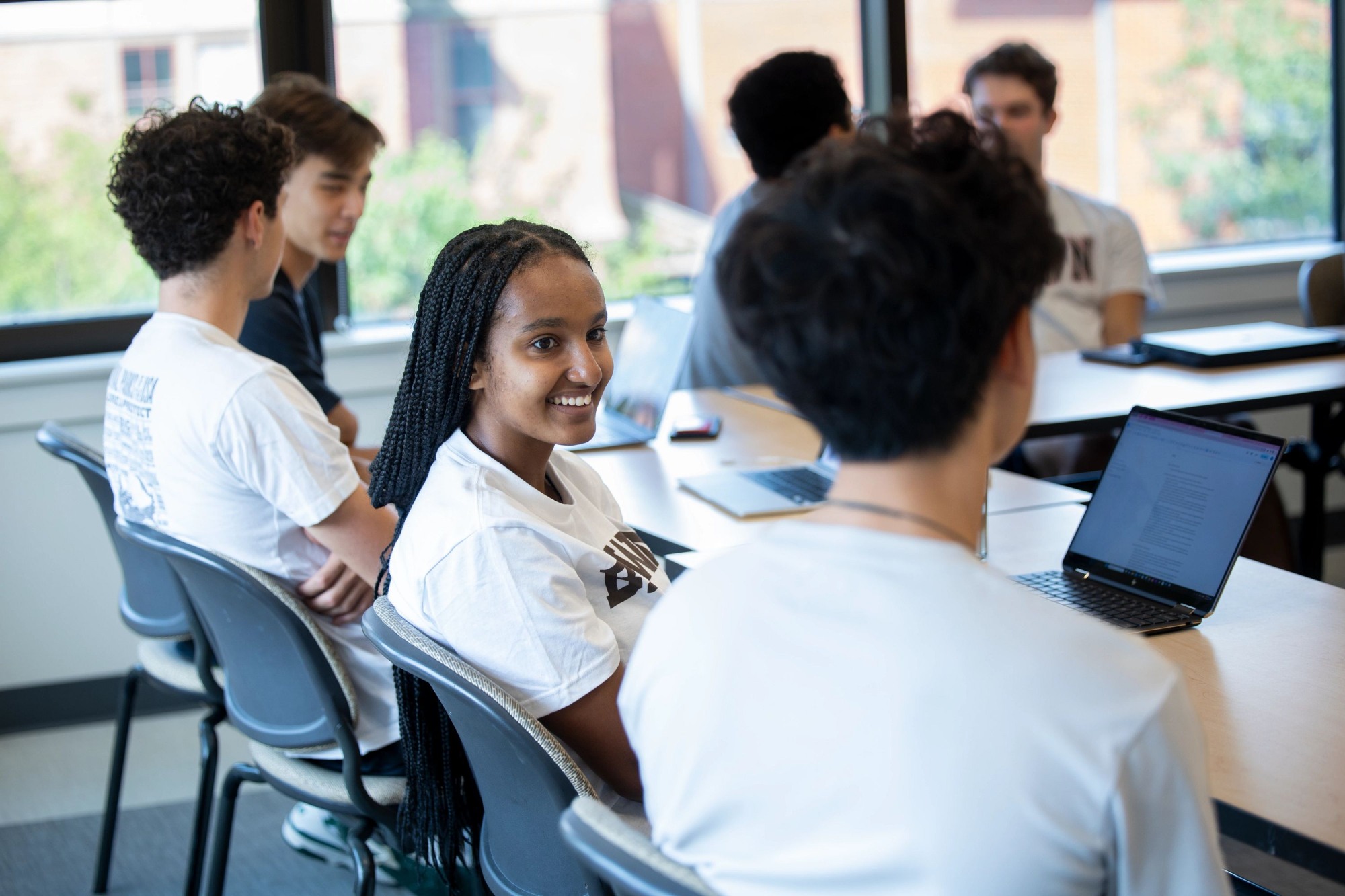 Student engage with each other during a class