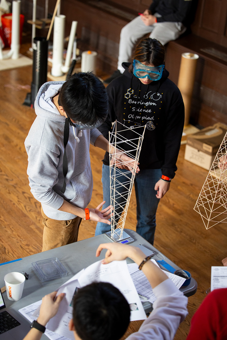 students weigh tower structure