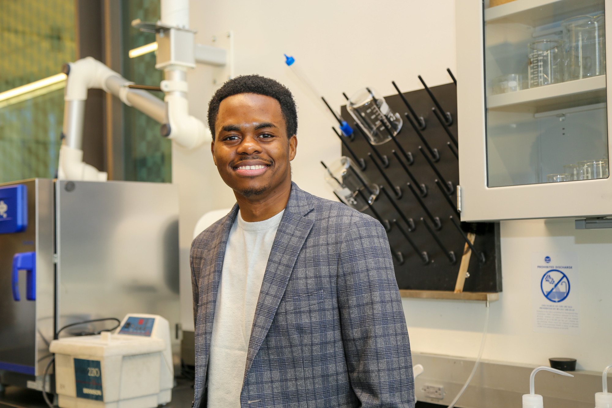 a photo of a person standing in a lab