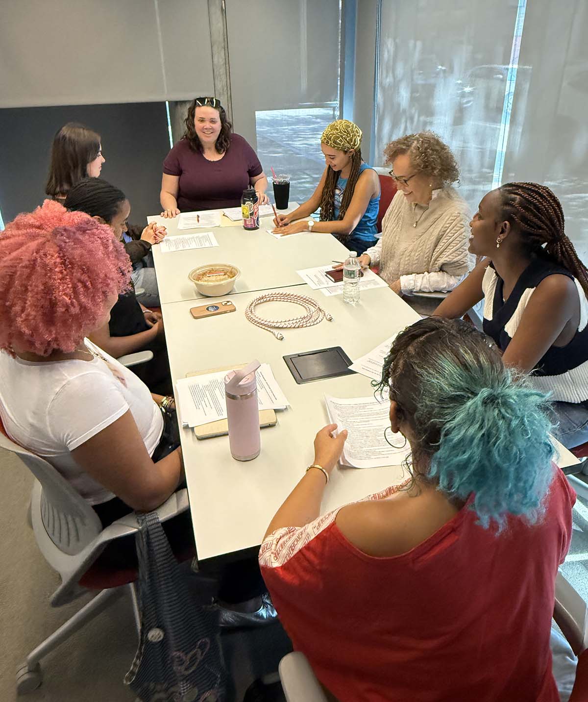 Brown employees learn about visitor services in a team training led by Becca Kittredge.