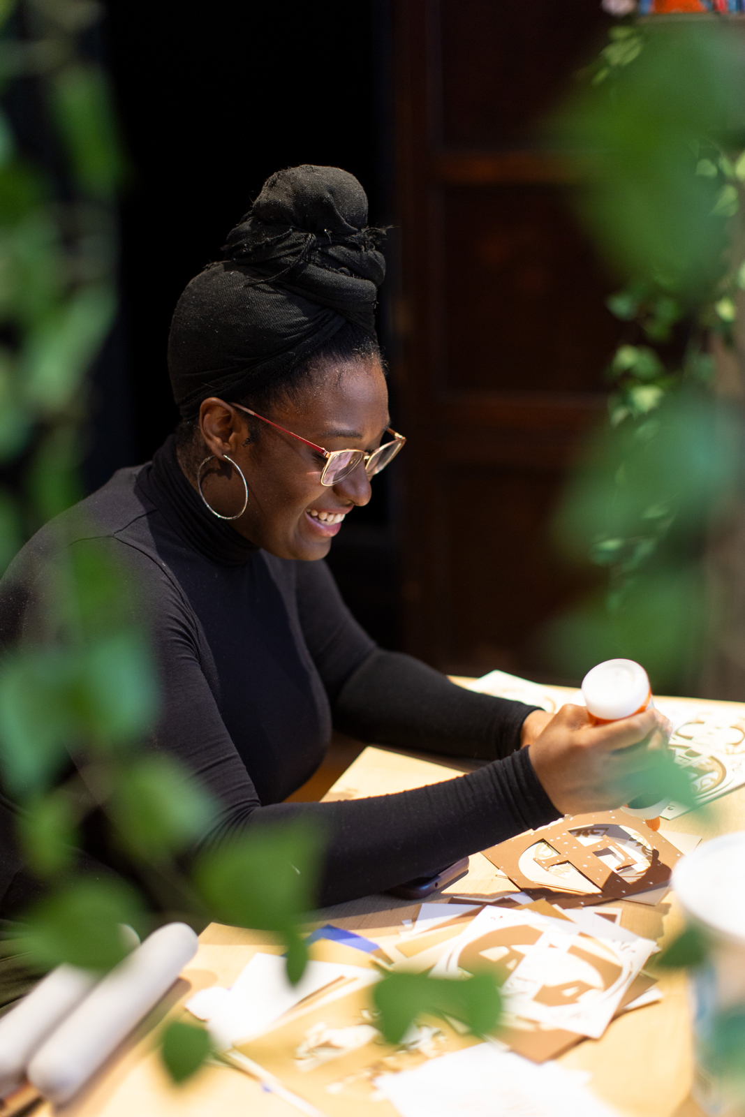 Teniesea Russell makes crafts for her students in Rochambeau House
