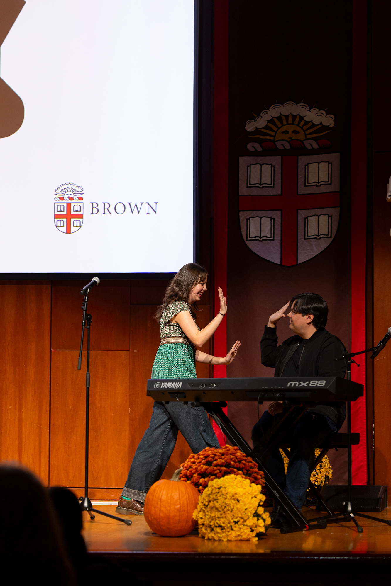 Kat Lopez high-fives her father, Robert Lopez