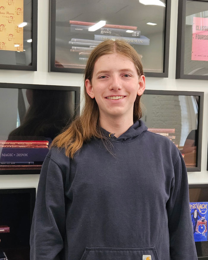 Andrew Ter Louw stands in Friedman Hall