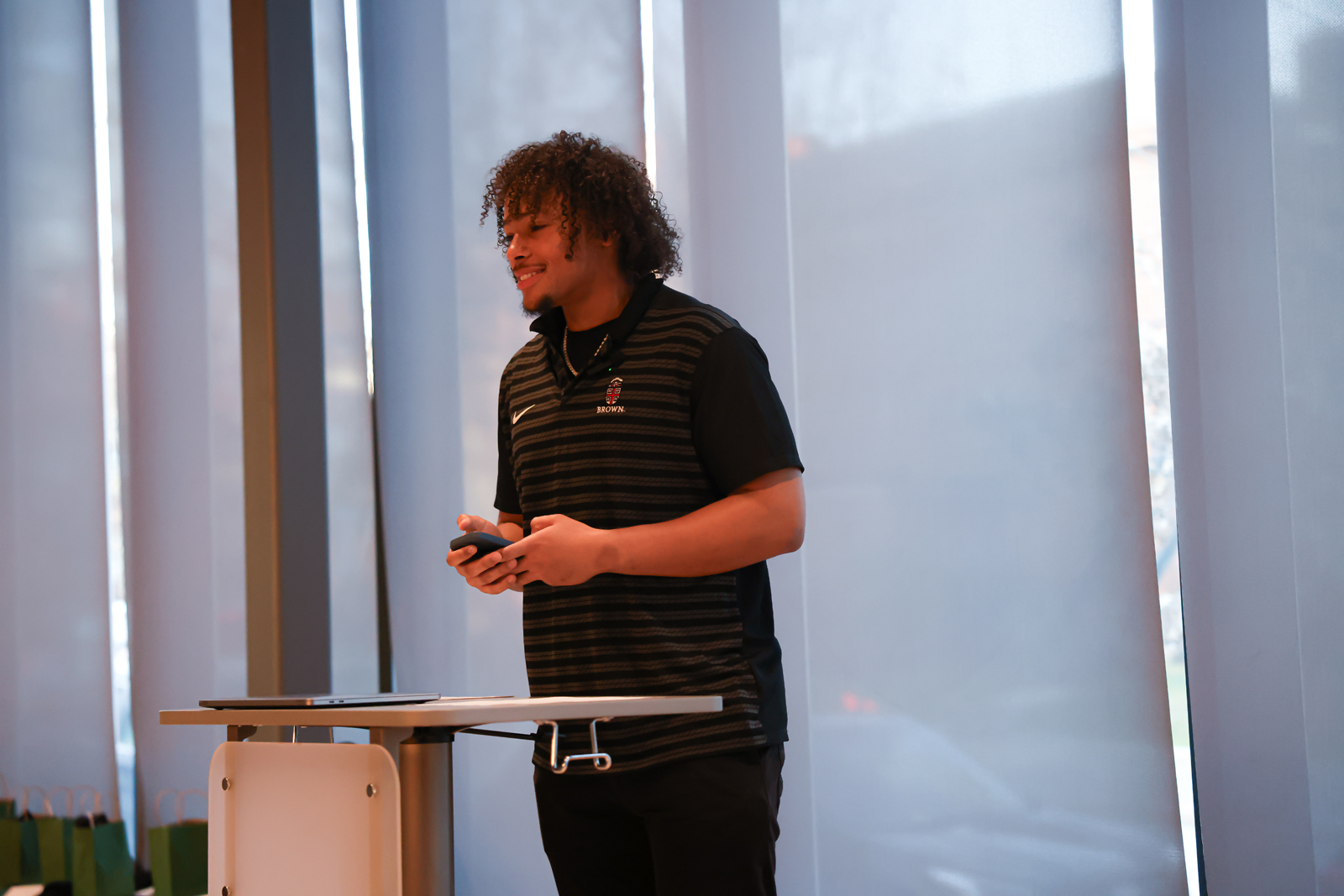 Hawk Okpokwasili speaks at Bruno Cares graduation ceremony