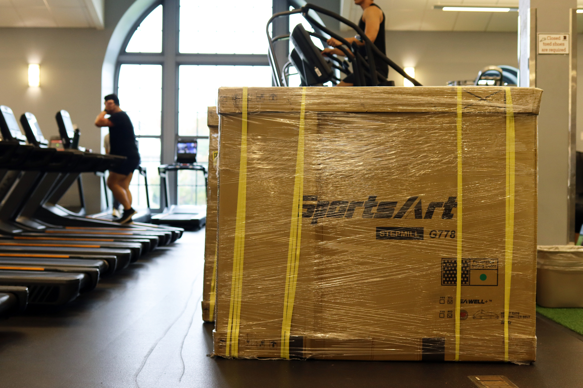Box containing stepmill sits in the gym