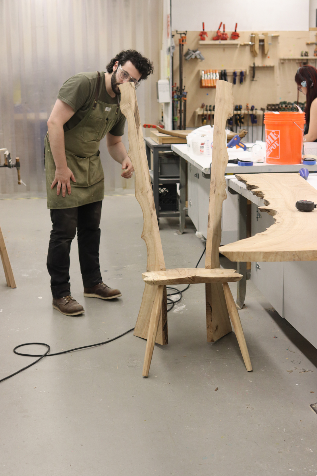Person building a wood chair