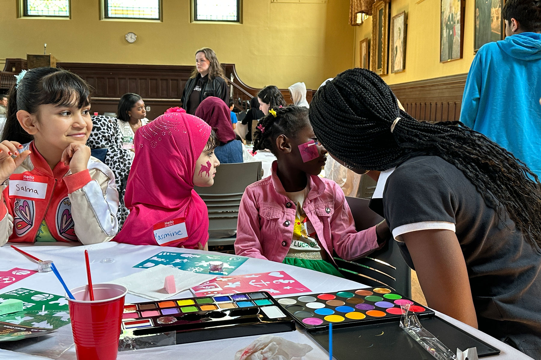 Tiffney Aina works with refugee children
