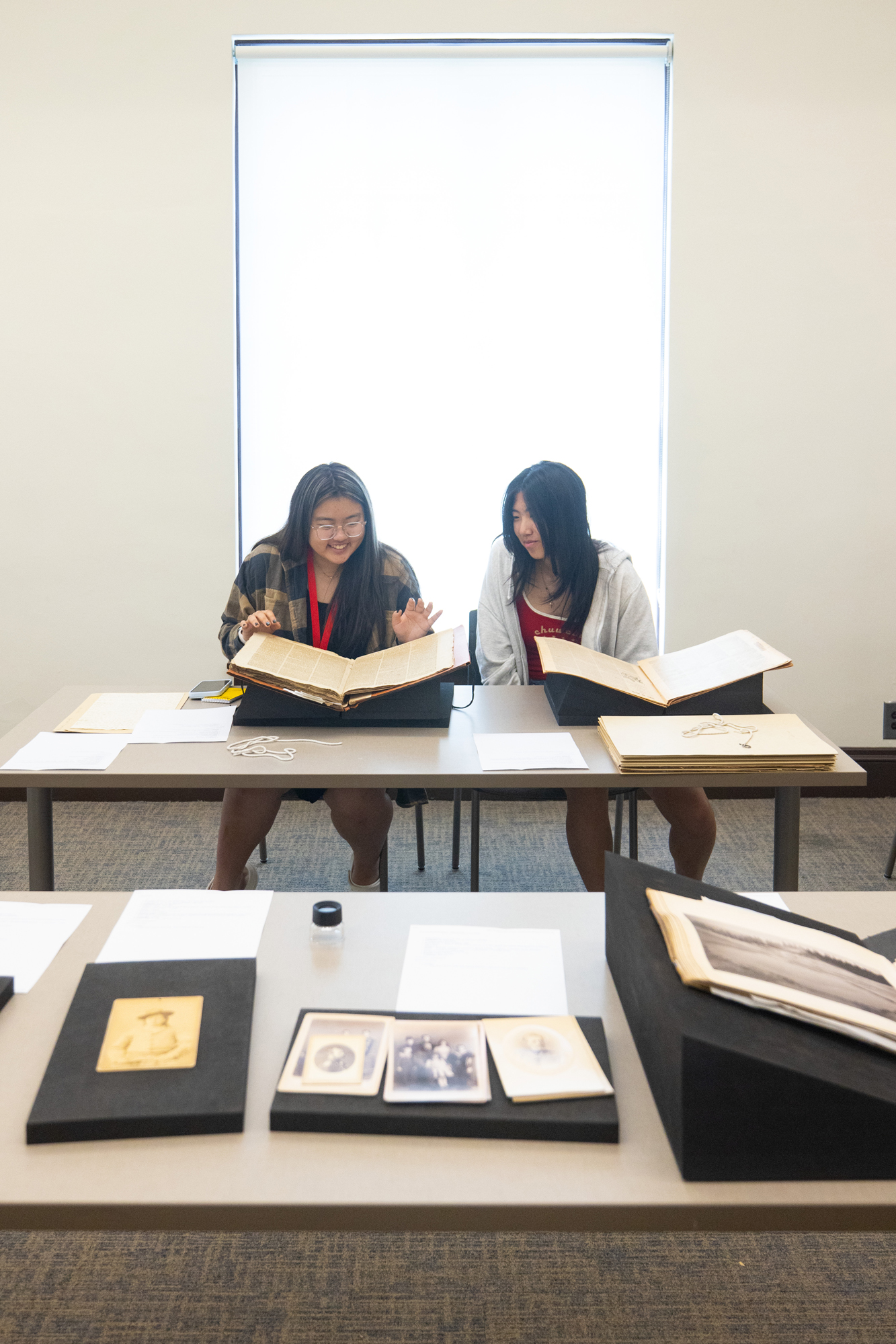 Students pore over historical manuscripts