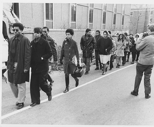 Black students marching across Brown campus during the walkout