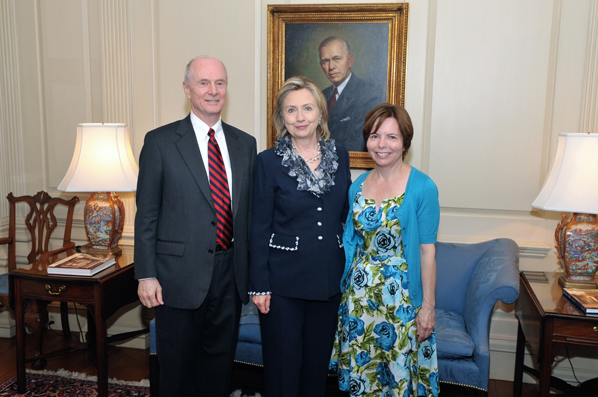 Savage and his wife meeting Hillary Clinton