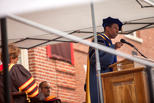 Andrew G. Campbell speaking from the podium