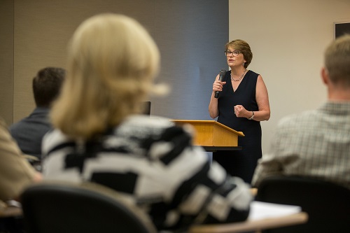 President Chrsitina Paxson speaking at a podium