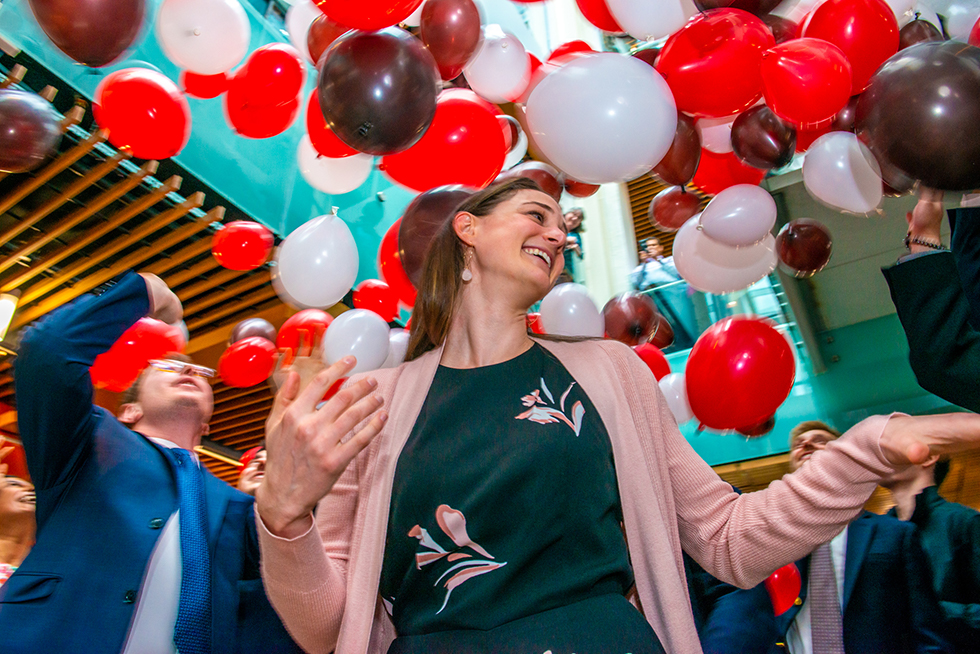 Balloons drop on students