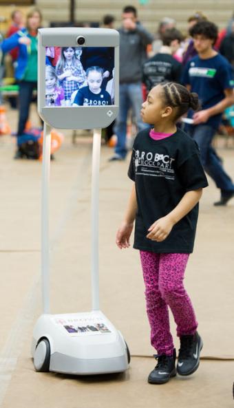 Girl with mobile video robot