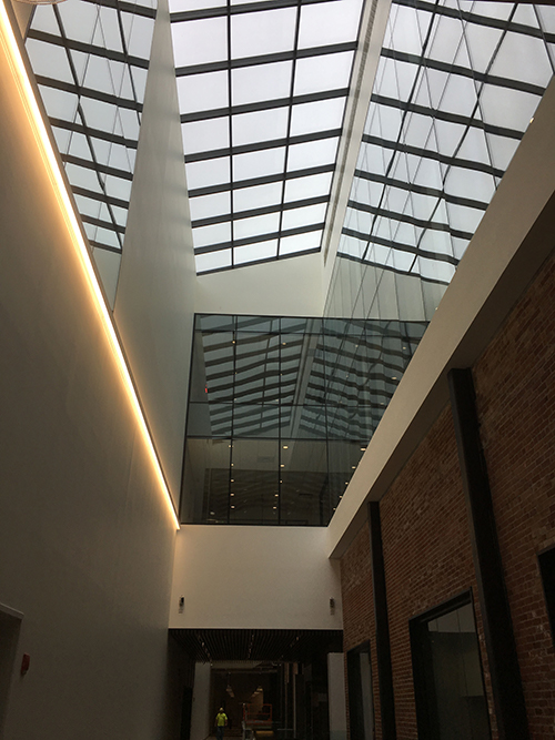 View of skylights from hallway below