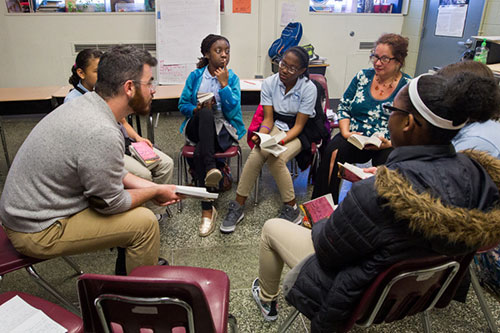 Brown students with middle schoolers