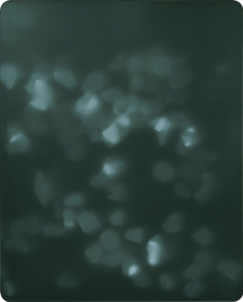 Dark background with blurry lighter dots