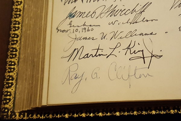 MLK's signature in a book at the John Hay library