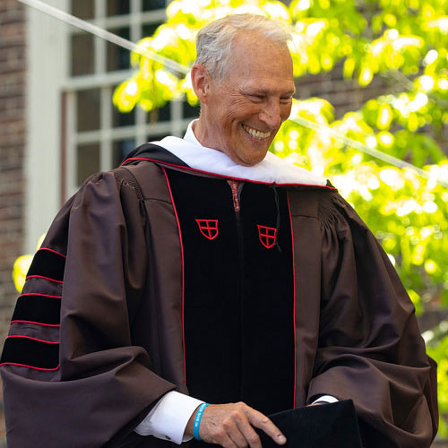 Kevin Mundt accepting an honorary degree