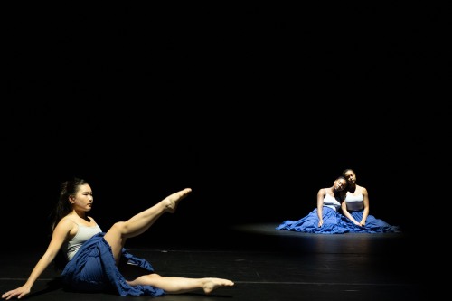 Three dancers on stage
