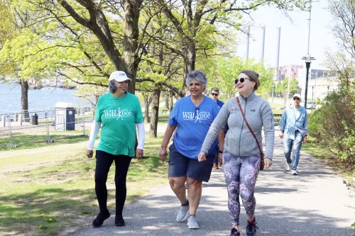 Providence residents stroll through India Point Park led by Dr. Mariah Stump