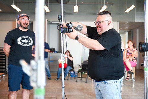 Leo Selvaggio sets up a camera during a Staff Development Day workshop