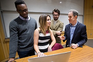 Danny Warshay with students in class