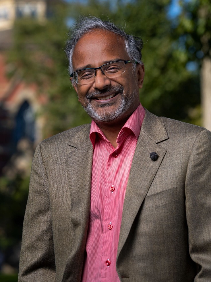 Suresh Venkatasubramanian standing outside