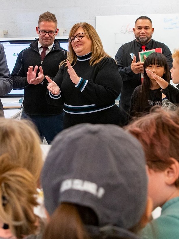 Lori Whalen clapping