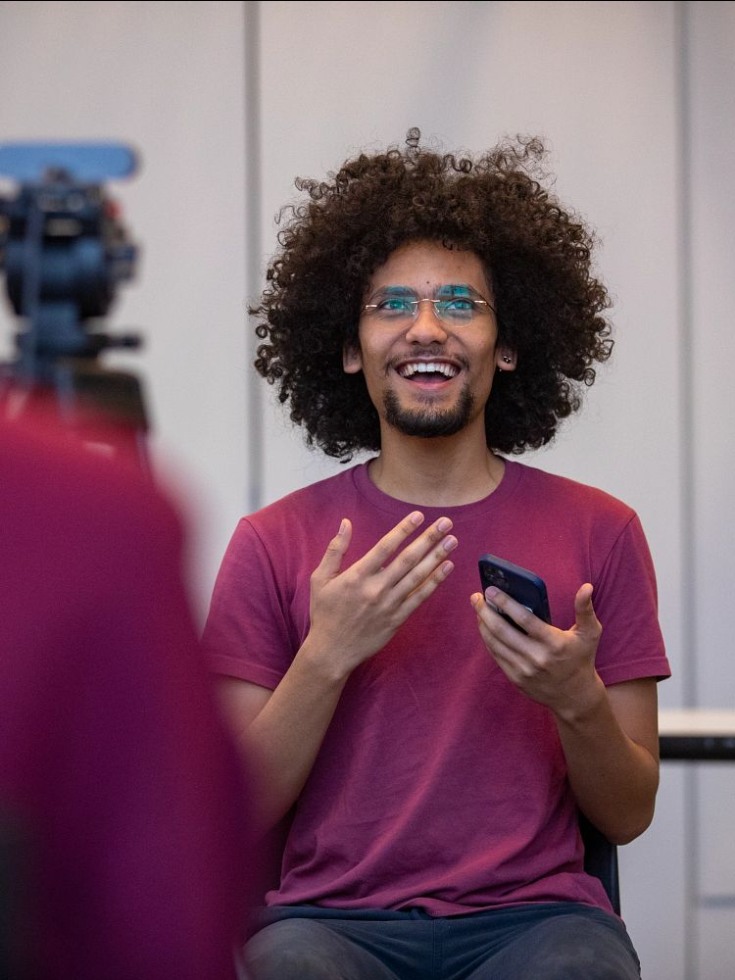 Luka Callicotte acting in front of a camera