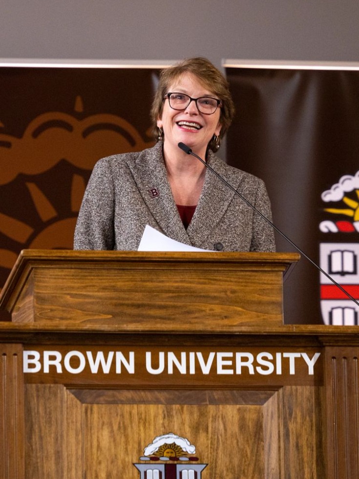 Christina Paxson speaking at a podium