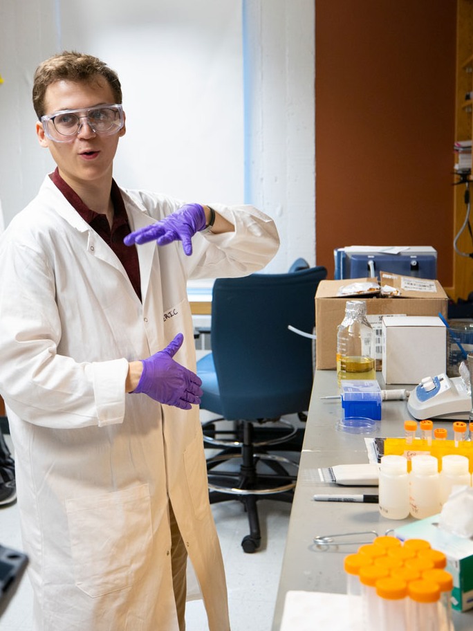 Eric Sorge walks through Vicki Colvin's lab