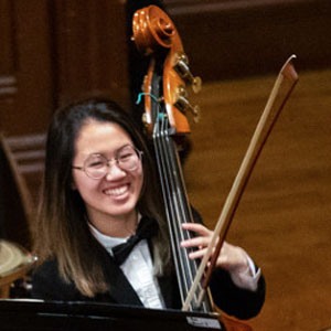 Student playing upright bass