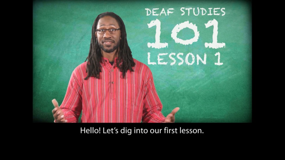 Video still with caption: Hello! Let's dig into our first lesson.