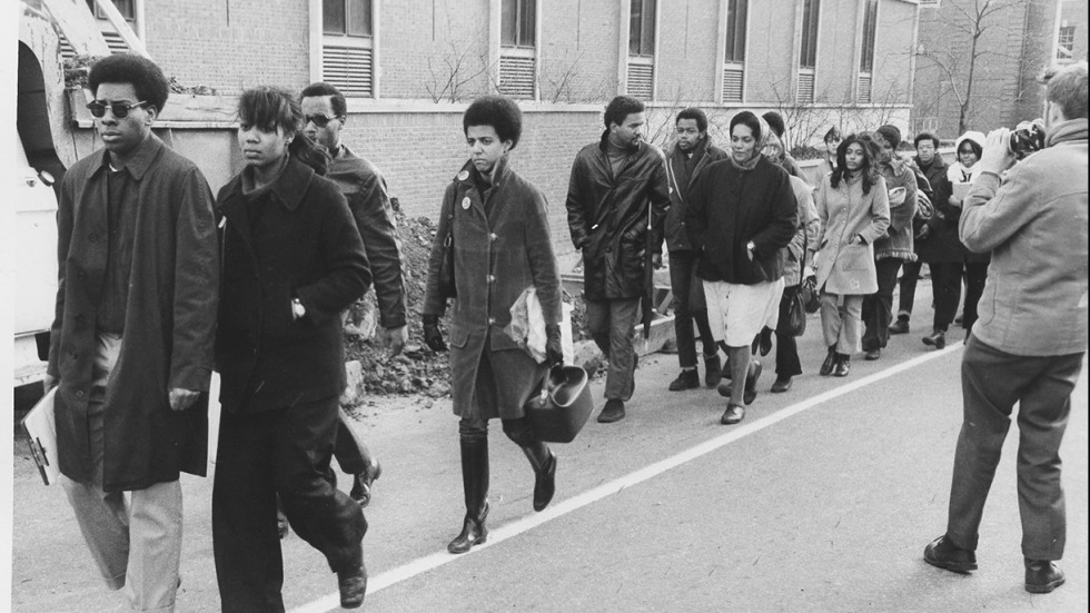 Black students walking across campus