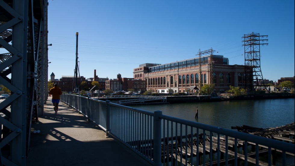 SSL building exterior as seen from across the river on Point Street Bridge
