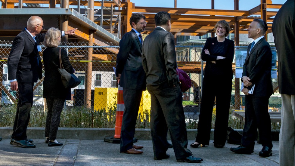 Paxson and others at the groundbreaking