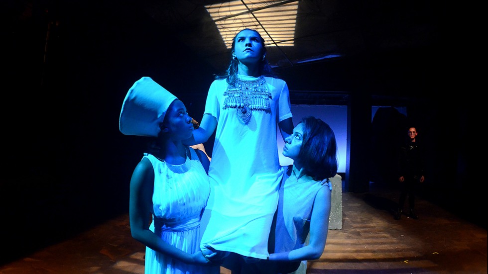 Maya Blake, Clementine Quittner, Tara Sharma illuminated in blue