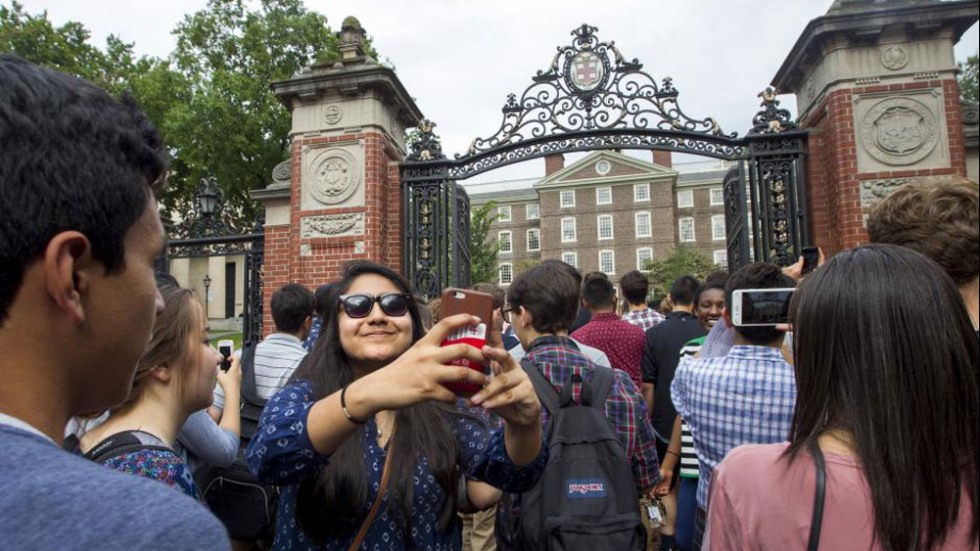 Students entering through the gates