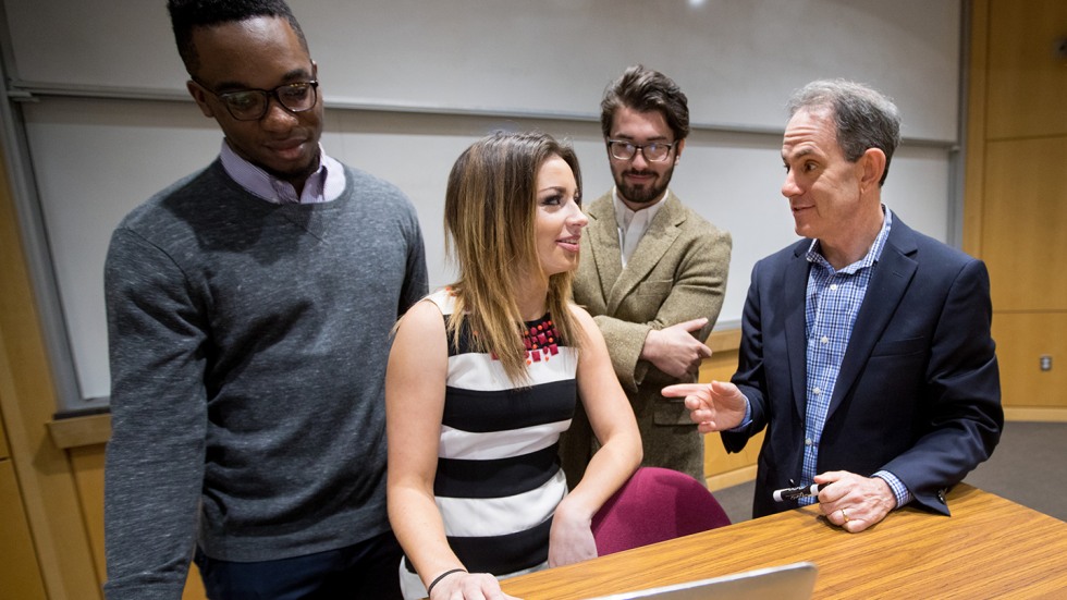 Danny Warshay and students in class