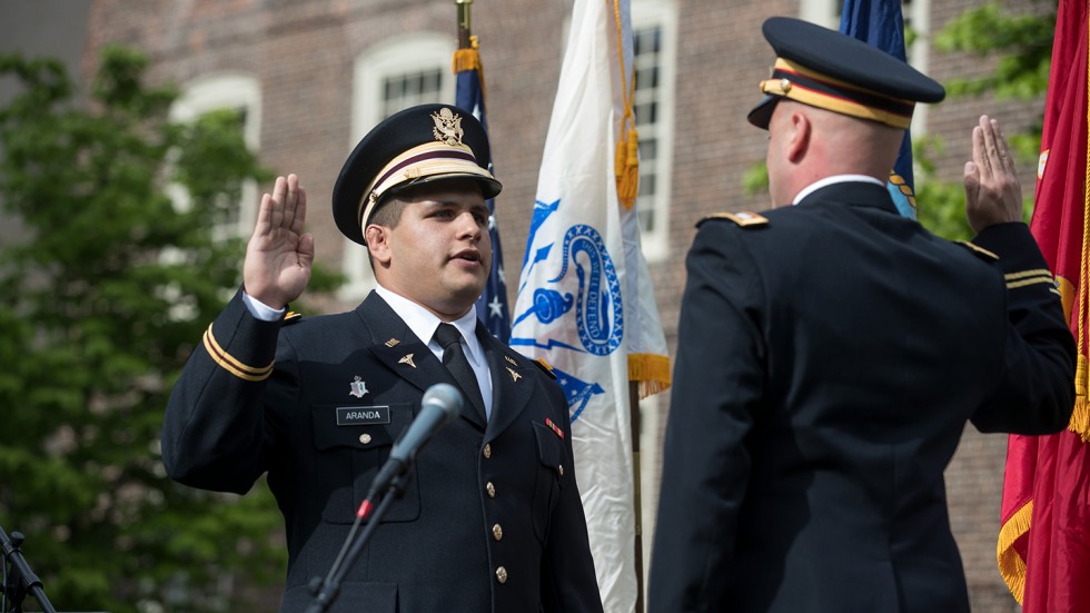 Marcos Aranda in dress blues taking oath