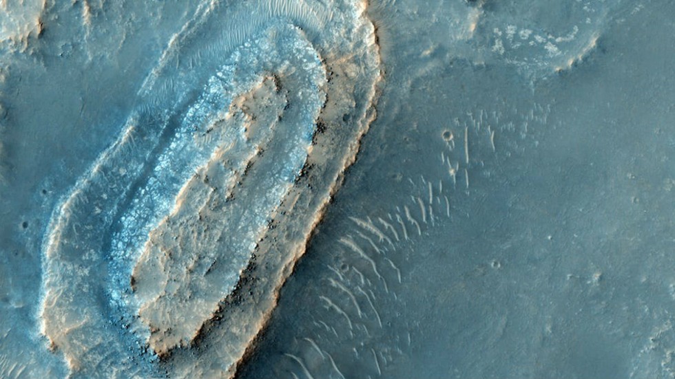 Aqua colored photo of mesa on NE Syrtis