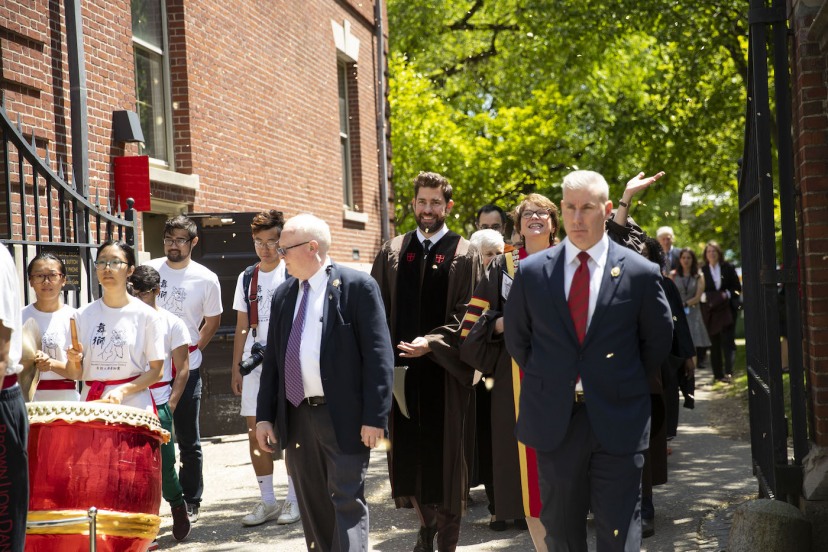 Brown University President Christina Paxson processed alongside Baccalaureate speaker and honorary degree recipient John Krasinski toward the First Baptist Church of America.