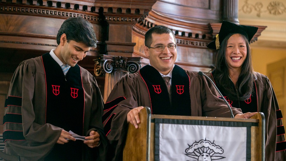 Drs. Kunal Sindhu, Marcos Aranda and Dorothy Liu at podium